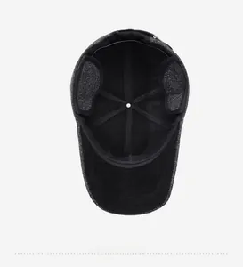 Detail view of the warm interior lining and fold-out ear flaps of the winter baseball cap