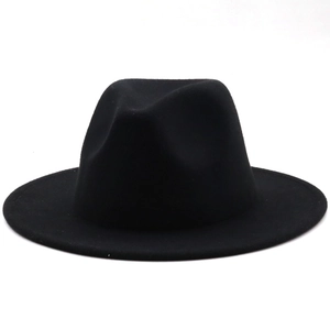 Classic black felt fedora hat featuring a vintage British style with a smooth wide brim