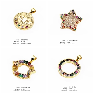 Detail view of copper pendants with zircon star and eye shapes including sizes and weights