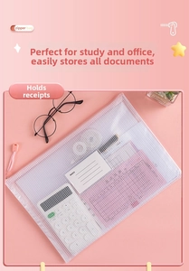Close-up of white A4 mesh document bag with pink zipper and index label for filing