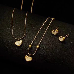 18K gold plated necklace and earrings set with heart-shaped white mother of pearl inlays