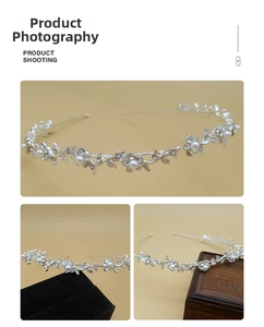 Detail of silver floral crown with white pearls and sparkling rhinestones for brides