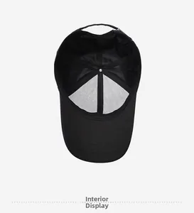 Detailed interior view of a black baseball cap showing reinforced seams and air vents