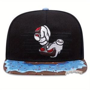 Detail of snapback hat featuring controller embroidery and bitten doughnut brim design