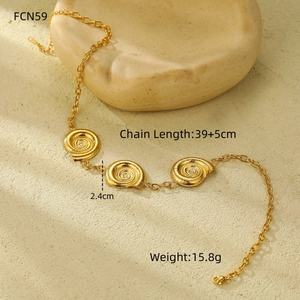 Detail view of 18k gold stainless steel snail spiral necklace with size specifications