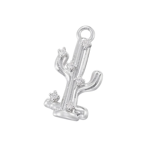 Macro shot of silver cactus pendant with shimmering zircon inlays and top hanging loop