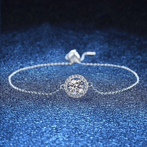 Elegant s925 silver moissanite bracelet with a sparkling sun pendant on starry background