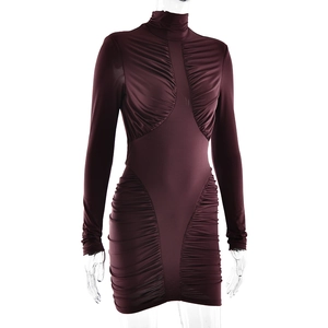Detail view of wine red bodycon dress with high neck and elegant ruched fabric texture