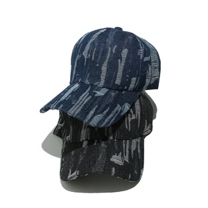 Distressed denim baseball caps in dark blue, grey, and black colors for a vintage hip-hop look