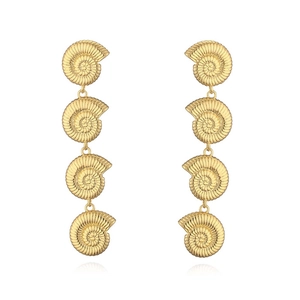 Macro detail of long gold shell earrings featuring four tiered spiraled seashell motifs