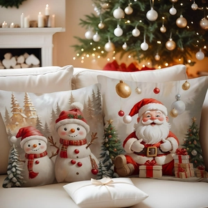 Detail of Christmas snowman and Santa Claus linen pillow covers on a cozy white sofa