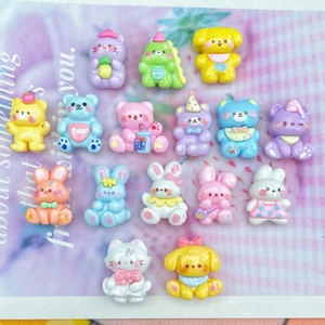 Macro detail of various colorful resin animal cabochons for DIY crafts and accessories