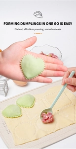 Detail of green heart-shaped dumpling mold set showing effortless pressing and smooth release