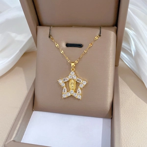 Titanium steel star necklace with religious relief and sparkling crystals in a jewelry box