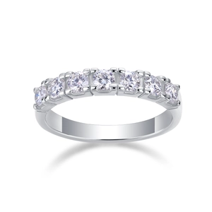 Macro detail of S925 sterling silver ring featuring seven prong-set round moissanite stones