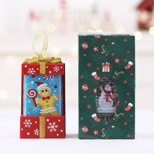 Luminous Christmas gingerbread man hanging ornament with festive green gift box decor
