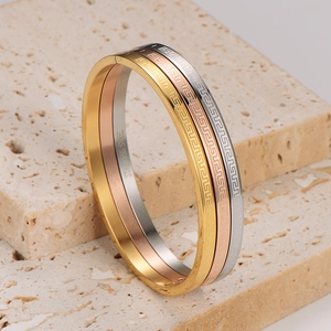 Drei Edelstahl-Armreifen mit griechischem Muster in Gold Roségold und Silber