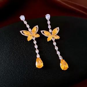 Boucles d'oreilles papillon de luxe français avec cristaux de zircone jaune élégants