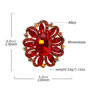 Vintage gold alloy flower brooch with red crystals and rhinestones, size 6.0x5.2cm