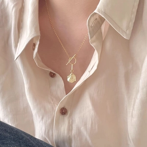925 silver gold irregular round pendant necklace with T-bar clasp shown on model