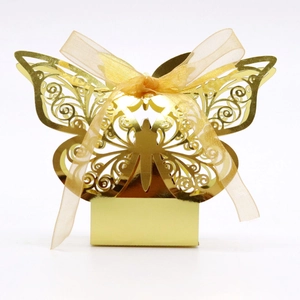 Golden laser-cut butterfly gift box with mirror finish and matching ribbon for wedding
