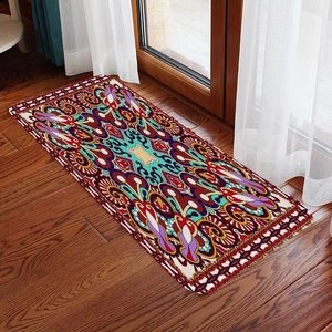 Bohemian geometric floral flannel absorbent runner rug on dark wooden floor