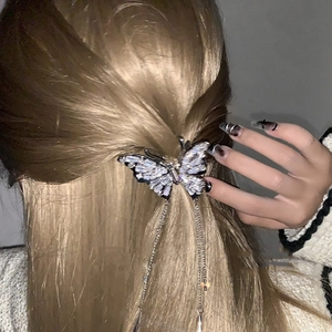 Sparkling butterfly hair claw clip with long tassels and silver rhinestone embellishments