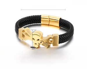 Macro detail of men's leather skull bracelet showing 215mm length and magnetic gold clasp