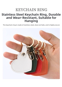 Detail of heart-shaped leather keychains in multiple colors with gold stainless steel rings
