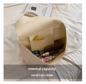 Interior view of cream white large capacity tote bag showing spacious storage space