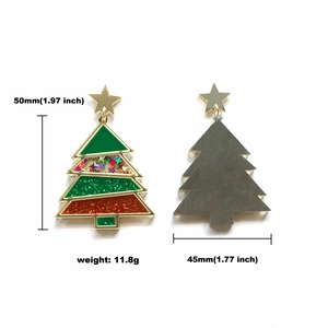 Detailed view of Christmas tree earrings with size specs 50mm height and 45mm width