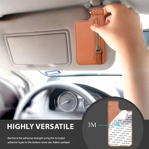 Detailed macro view showing the brown woven card holder with 3M adhesive backing and zipper