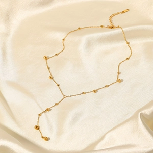 Elegante collana a Y in acciaio inossidabile placcato oro 18K con ciondoli a nappa e sfere