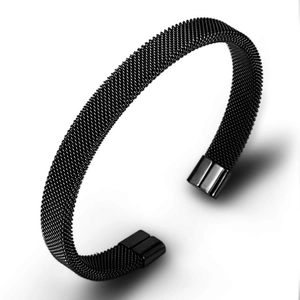 Close-up of black Milanese mesh titanium steel bracelet with open-cuff design details