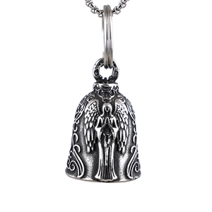 Macro shot of stainless steel motorcycle guardian bell pendant with angel engraving