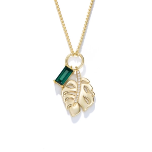 925 silver gold necklace with emerald zircon and monstera leaf pendant on white background