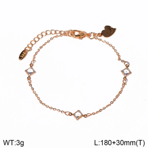 Macro view of gold butterfly bracelet with white zircon details and dimension labels