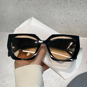 Polygonal black frame sunglasses with dark brown lenses for men and women