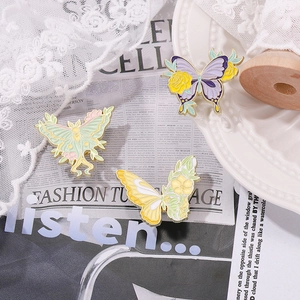 Exquisite butterfly and lily floral enamel brooches with vintage metal finish in three colors