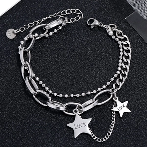 Double-layered silver stainless steel bracelet featuring star luck charms and curb chains