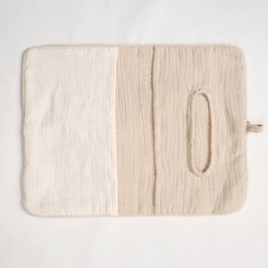 Detail of double-layer cotton muslin nursery organizer with compartments and wipes dispenser
