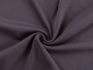 Close-up of deep purple high-density knit fabric showing soft texture and fine grain