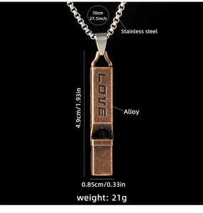 Detail of vintage bronze whistle pendant with LOVE engraving and 70cm steel chain