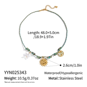 Detail of bohemian woven necklace showing 48cm length and stainless steel charms