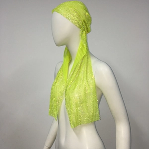 Detail of neon green rhinestone mesh headwrap showing sparkling crystals and net texture