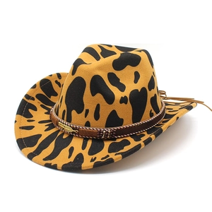Western wool cowboy hat with cow print pattern and beaded feather hatband decor