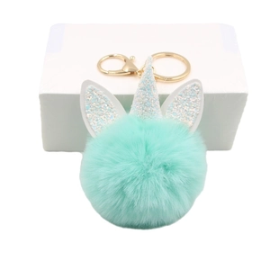 Mint green pompom unicorn keychain with glitter horn and golden lobster clasp