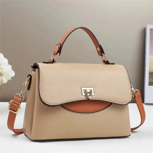 Chic beige and brown contrast leather handbag with litchi texture and gold lock buckle