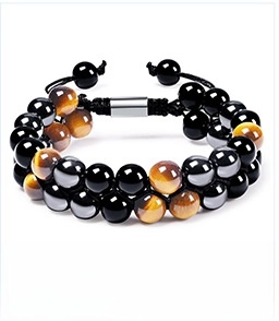 Detail of adjustable double-layer beaded bracelet with yellow tiger eye and black stones