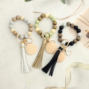 Checkerboard silicone bead keychain bracelet with leather tassel and wood tag for women